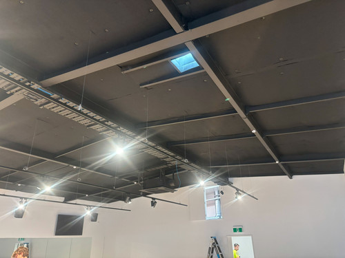 Southtile Insulation install of  Autex AAB 35-50 Black to the ceiling.