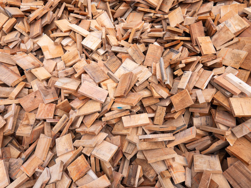 Pile of dry firewood that are off cuts and easy to handle
