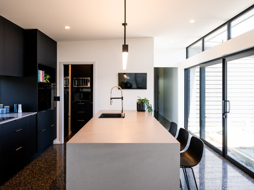 The Caesarstone benchtop which is finished in Sleek Concrete