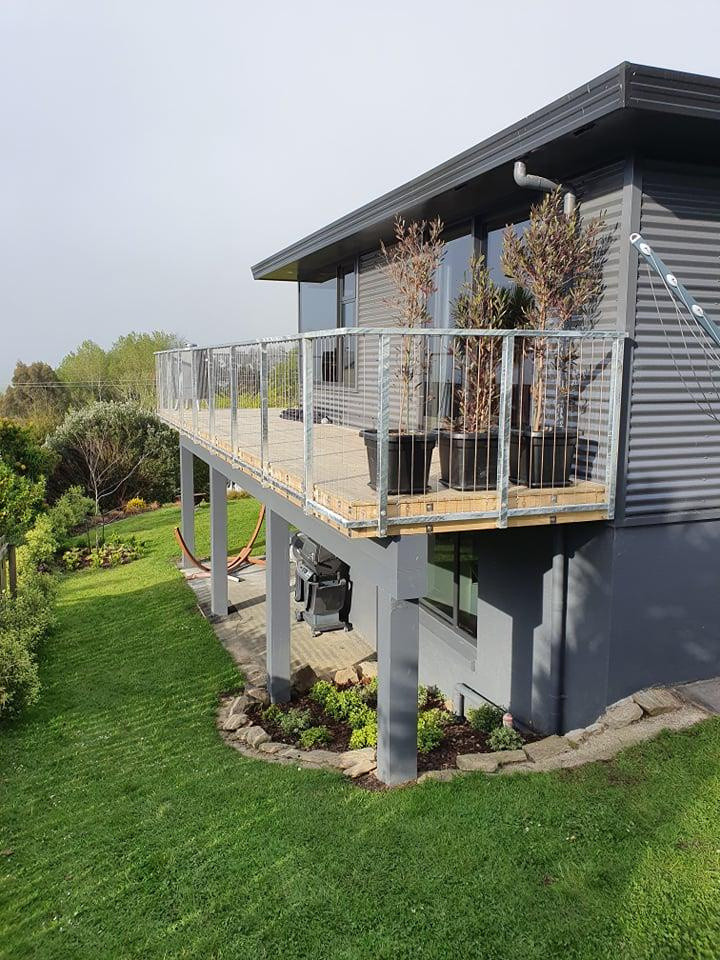 Steel balustrade laced with stainless steel wire made by Otago Engineering.