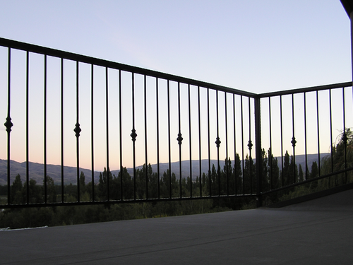 Deck railing with wrought iron detailing