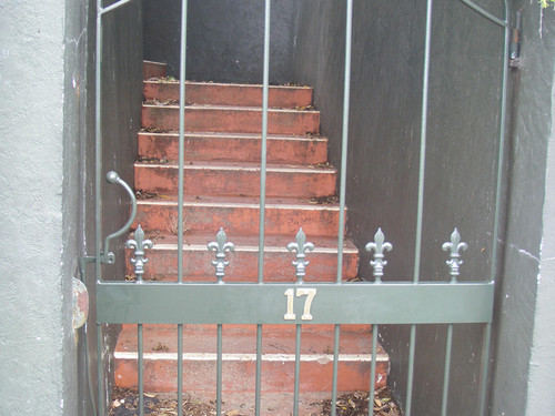 Wrought iron gate to stairs