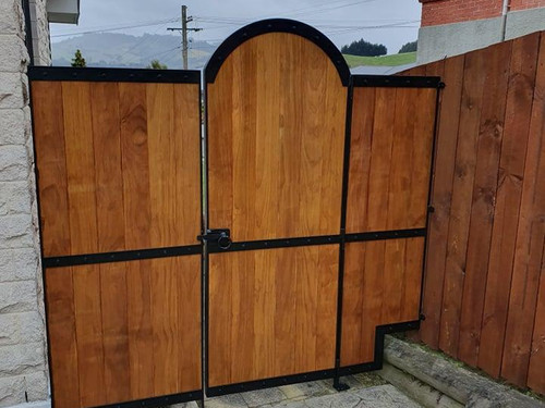 Steel framed gate with wood inserts