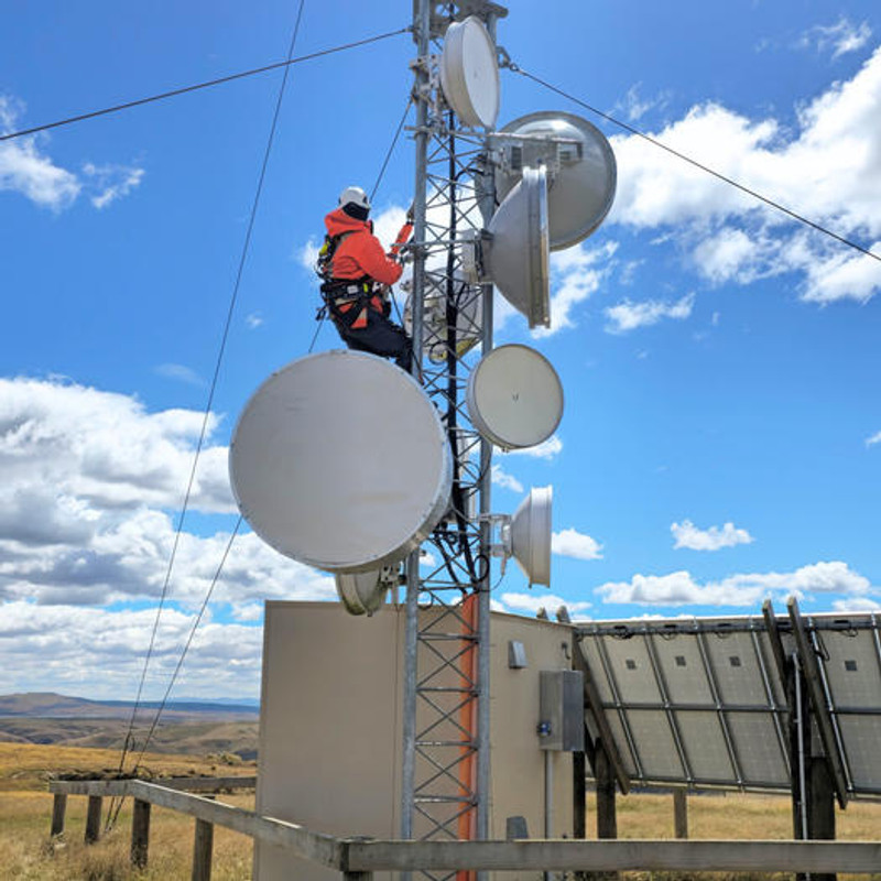 A Unifone technician hard at work on a repeater
