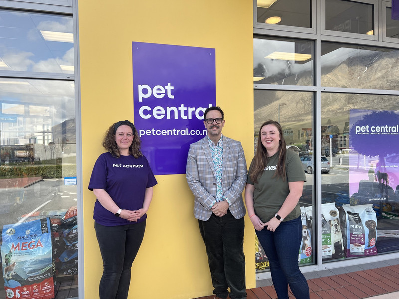 Pet Central shopfront with owners / managers in front