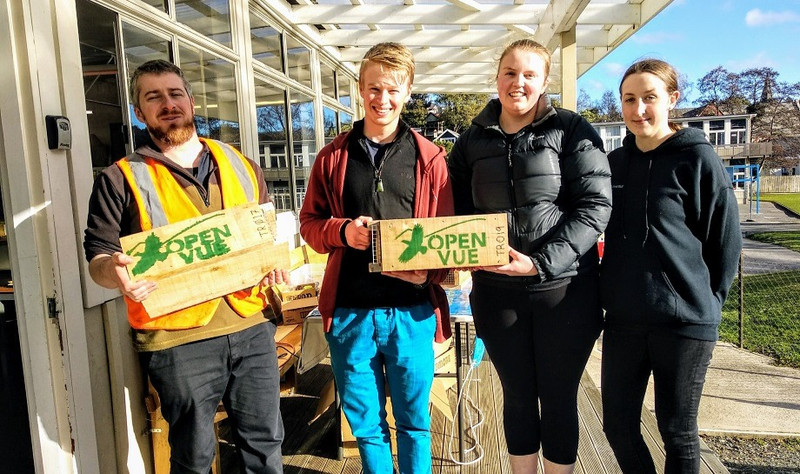 Volunteers Tom, Liam, Tessa and Sam with Rat Trapboxes made as part of a Trapbox workshop. Photo: Clare Cross