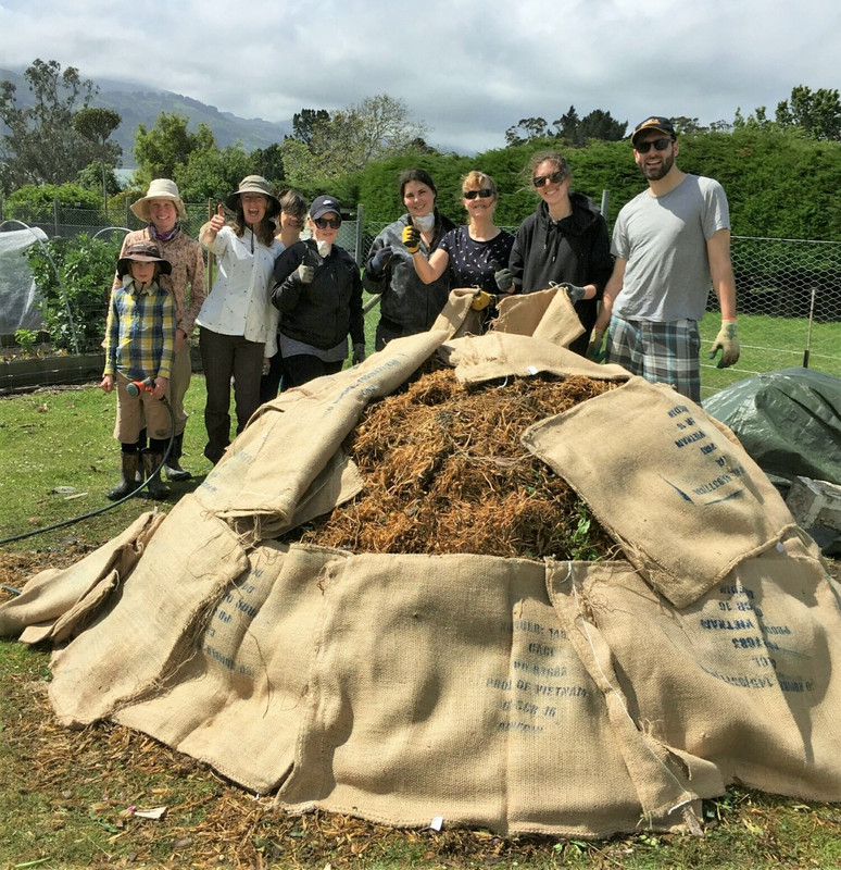 Michelle Cox, third from left, doing some hot composting in Macandrew Bay.