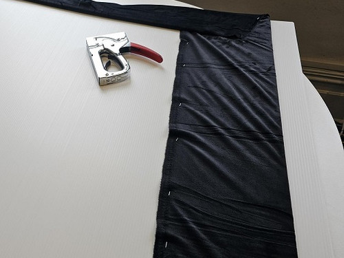 Covering the poppy base boards with black velvet