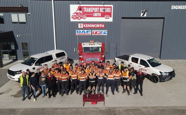 The whole team from Transport Repairs Christchurch with cups. 