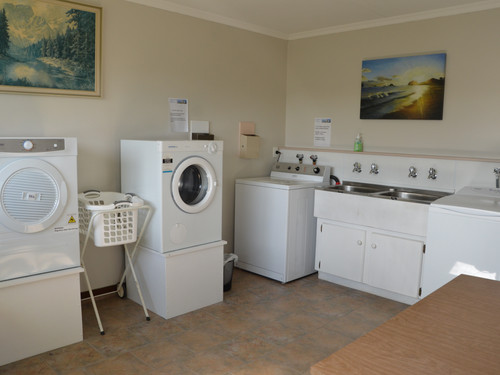 Two washing machines and two driers 