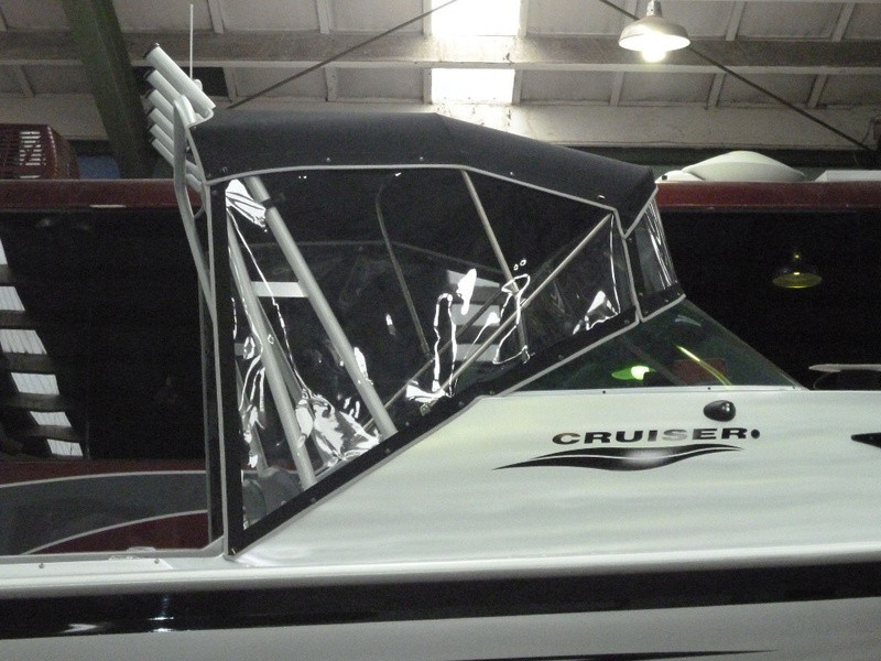 Bimini on arch with clear front and side curtains