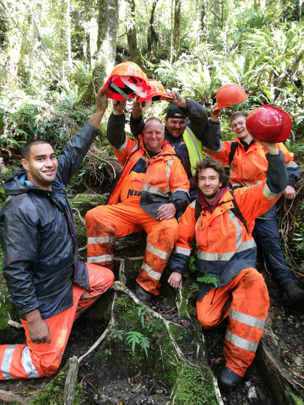 Some of the Nind Dairy Services team after reaching the summit