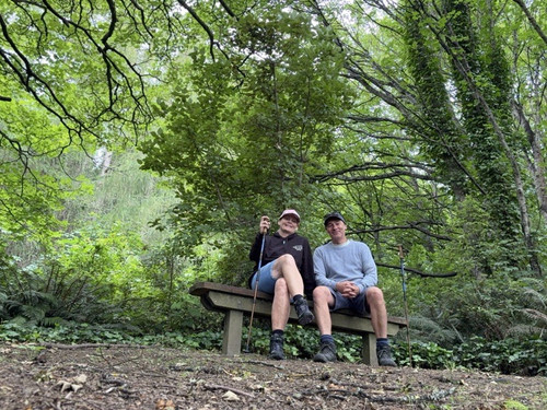 Paul and Steffi sitting on a bench in Gabriels Gully