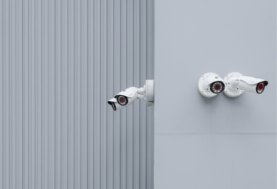 CCTV cameras on a wall.