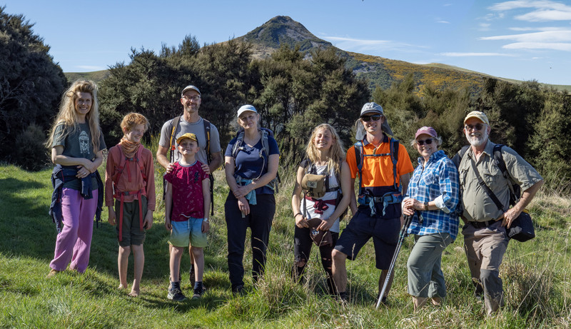 A group of hikers at the end of the trail... in front of Hikaroroa