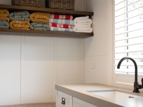 The laundry with a mud room combination, a well thought out space adds multipurpose value. 
