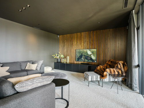 Timber panelling with mood tones creates natural comfort 