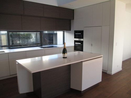 Interior designed kitchens include timber flooring and granite bench tops