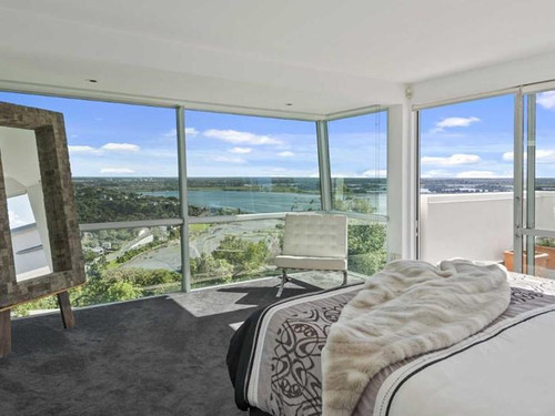 Bedroom views enhanced with large-scale windows