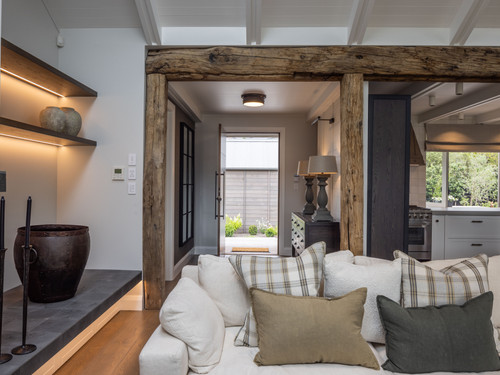Making the imperfect French Oak beams belong in a room full of clean crisp detailing.