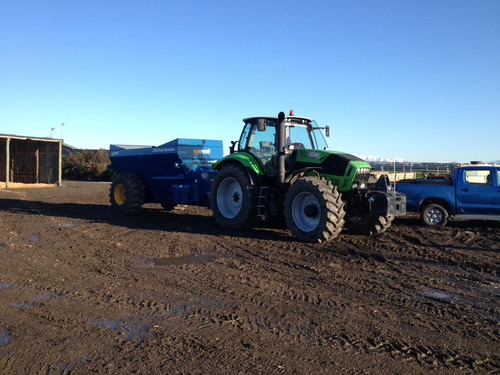 tractor and muck spreader 