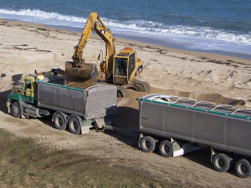 Southern Transport Truck and Trailer getting loaded at the beach 