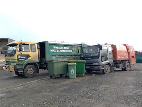 Joes Refuse and Southern Transport waste wheelie Bin Trucks lined up 
