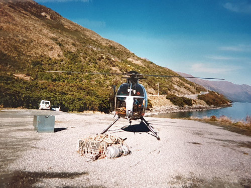 The helicopter taking the equipment up to the mountain