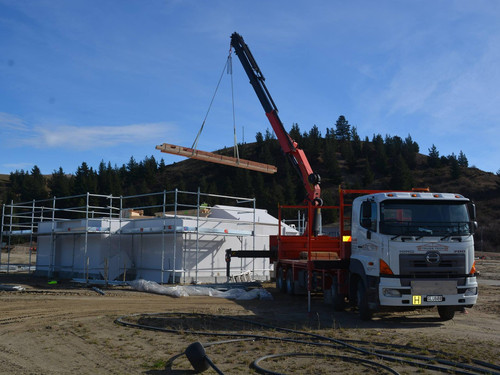 A crane working at the Golden View Lifestyle Village