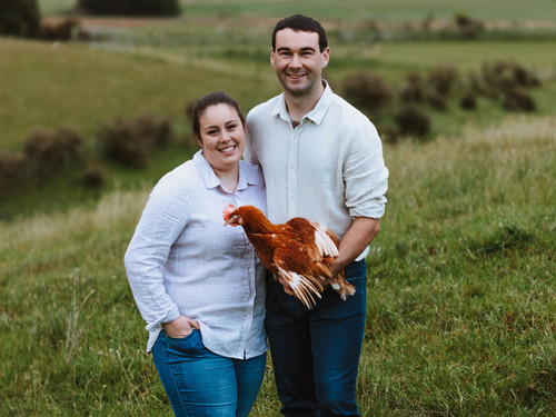 TIm and Jess with one of their chickens